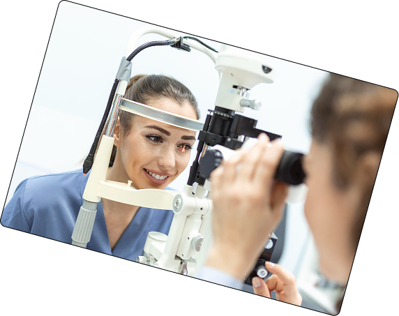 Doctor examining a patient with a slit lamp